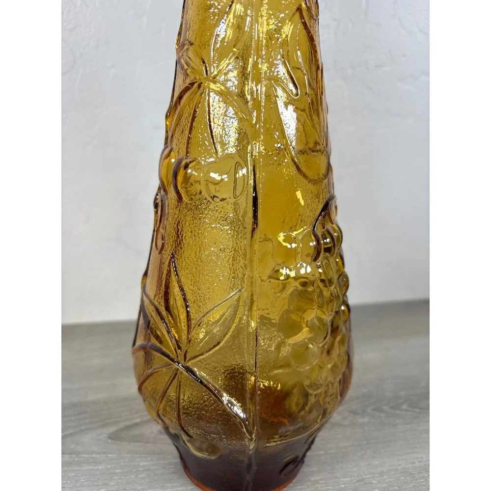 Vintage Empoli Amber Glass Genie Bottle Decanter Floral Embossed Grapes MCM 15.5